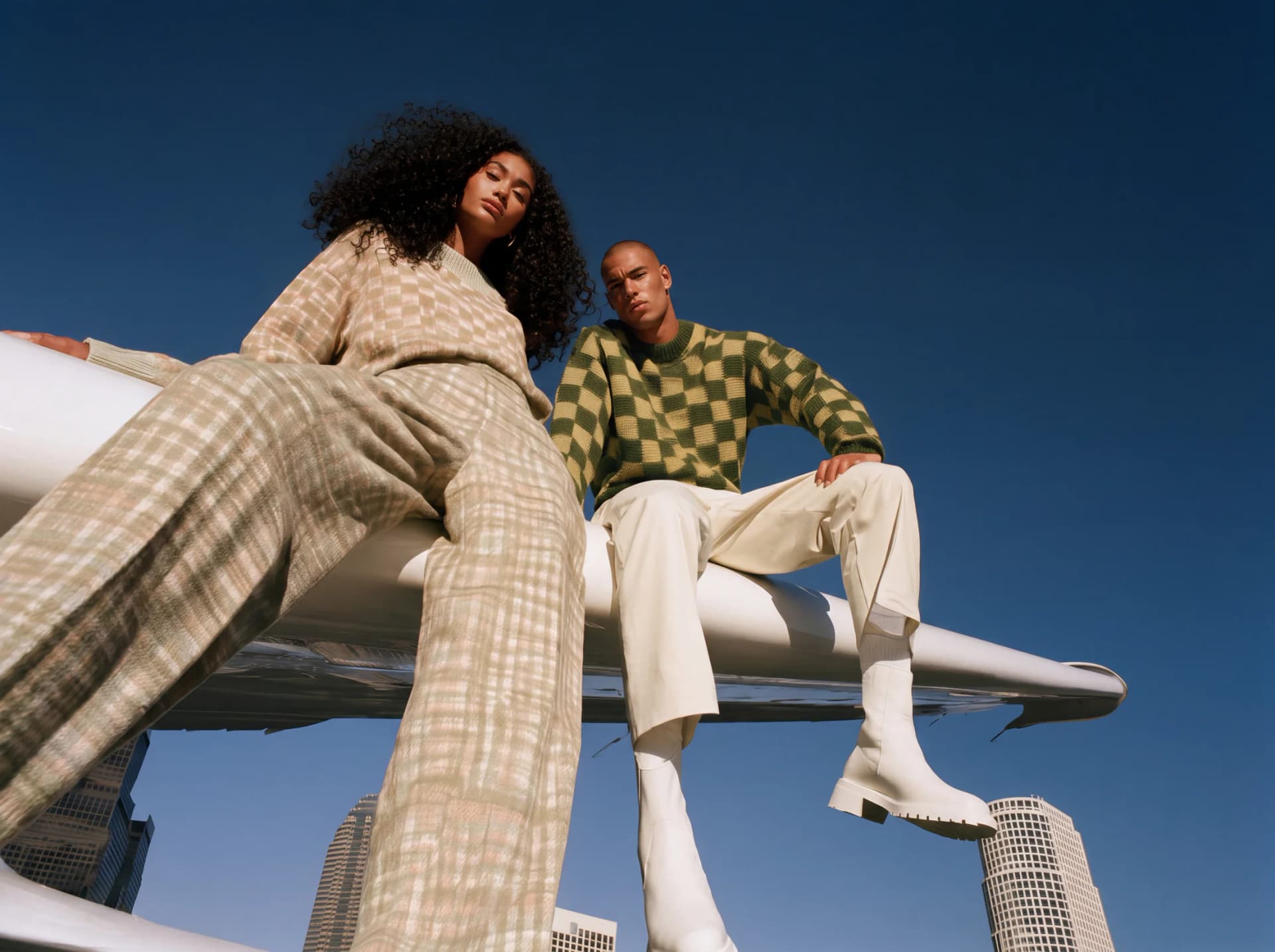 Two members of a creative team in an editorial fashion shoot